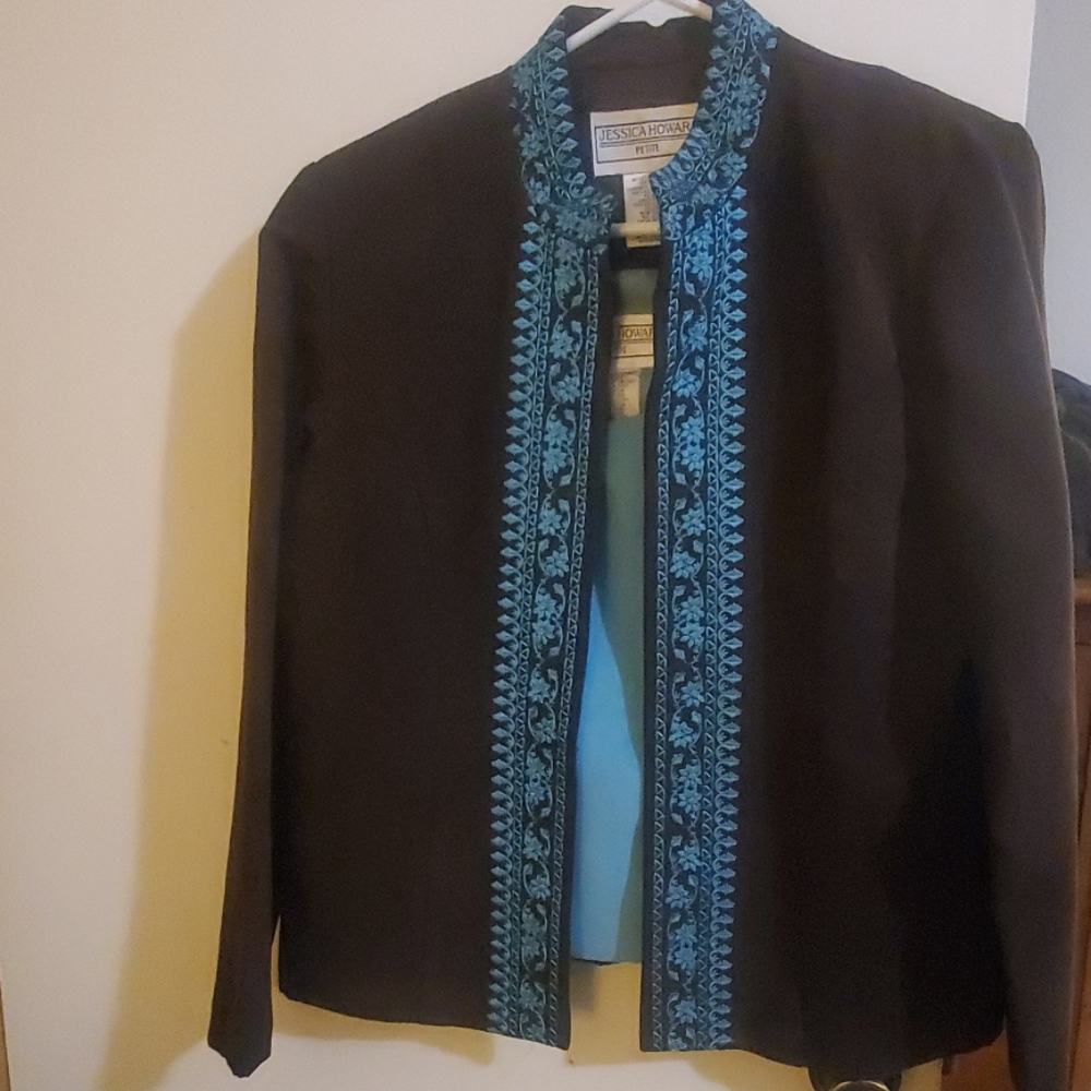 Brown and teal blazer and teal under shirt
